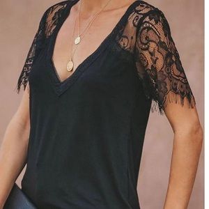Black shirt with lace trim sleeves